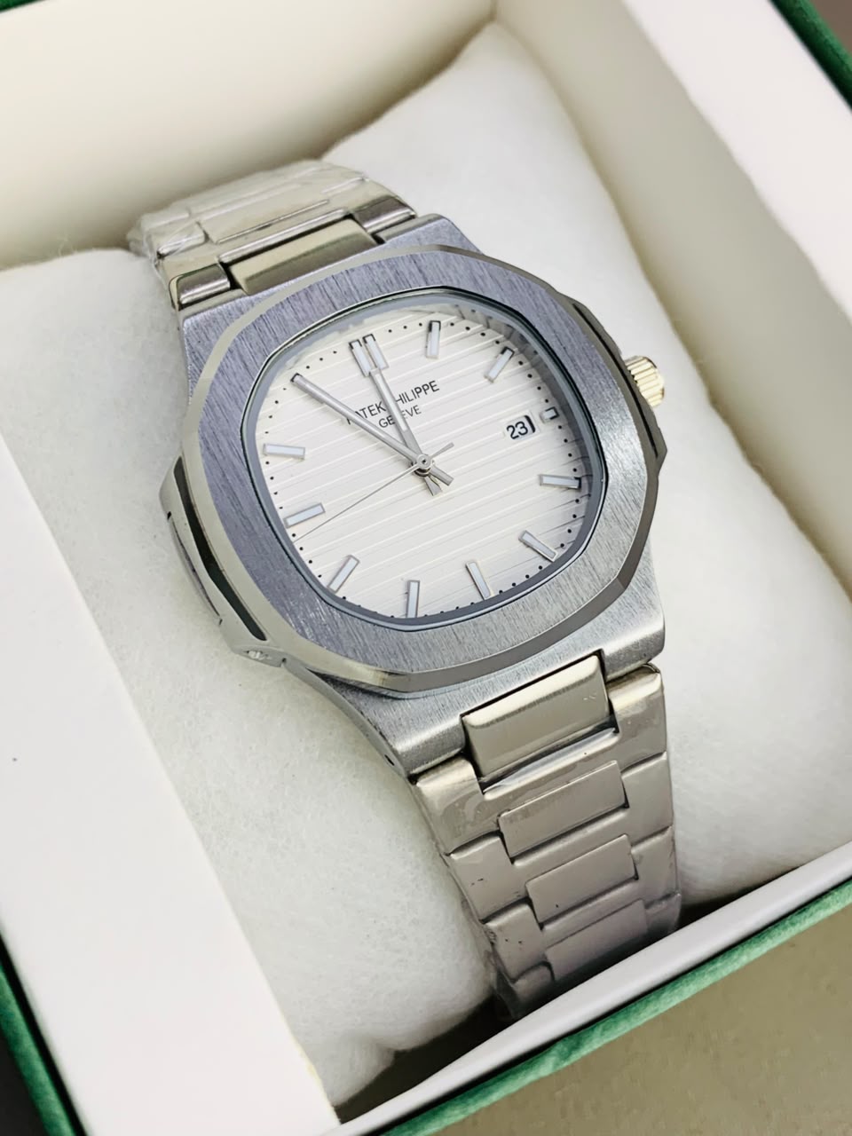 Patek Philippe Nautilus Luxury Automatic Sports Watch – Stainless Steel & Blue Ribbed Dial