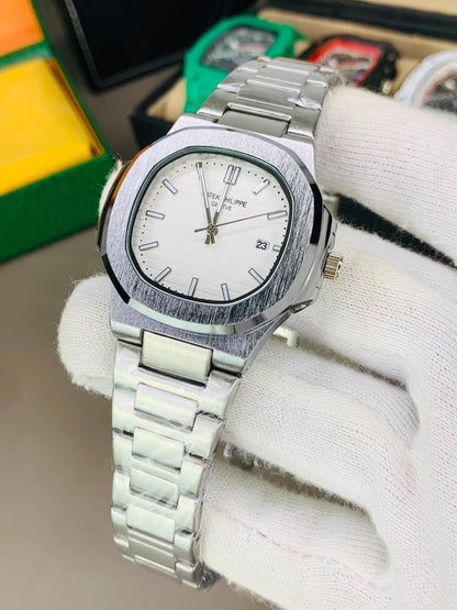 Patek Philippe Nautilus Luxury Automatic Sports Watch – Stainless Steel & Blue Ribbed Dial