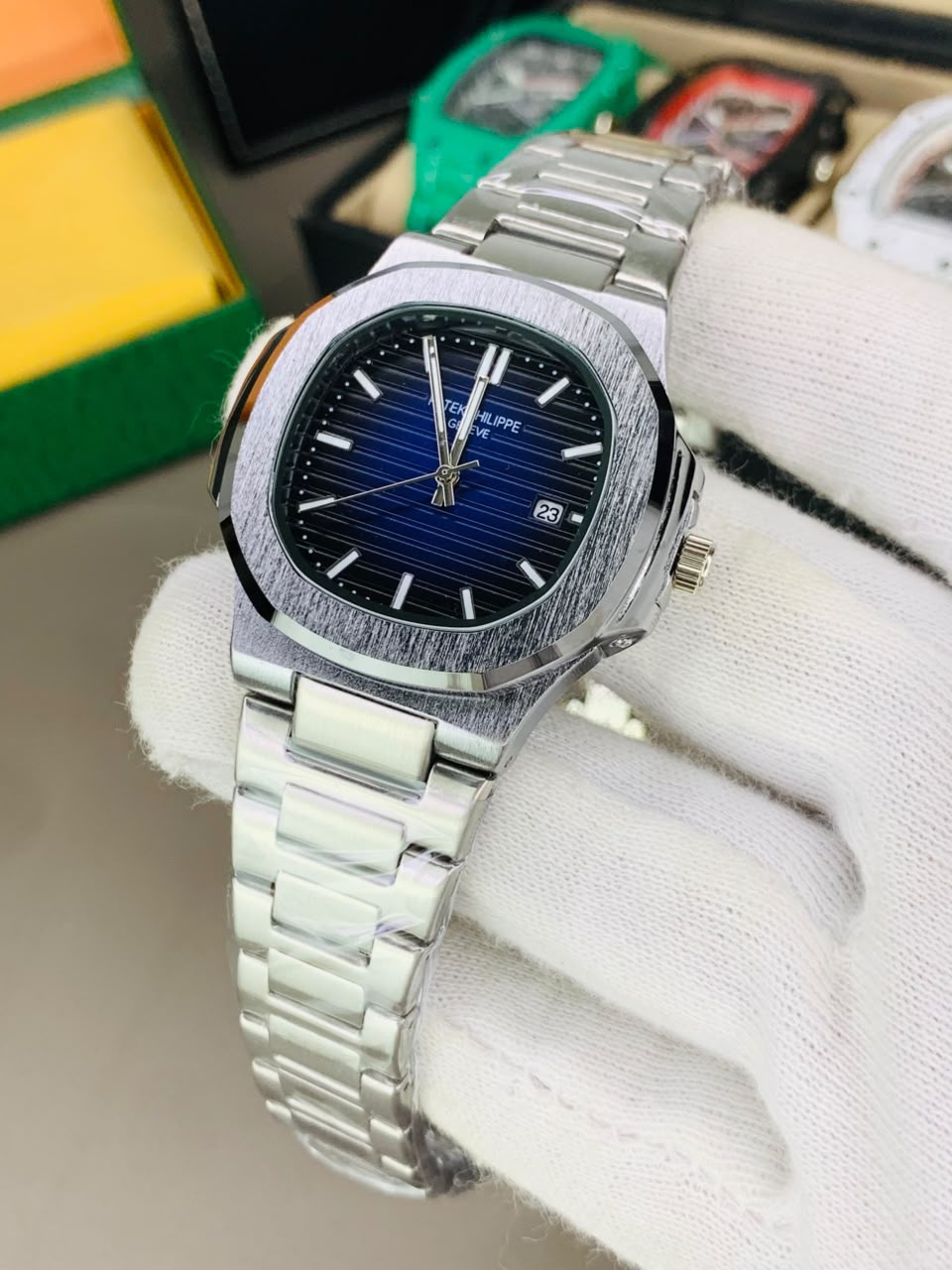 Patek Philippe Nautilus Luxury Automatic Sports Watch – Stainless Steel & Blue Ribbed Dial